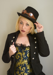Steampunk girl doffs hat