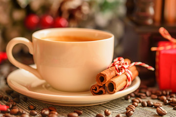 Cozy winter setting with cup of coffee