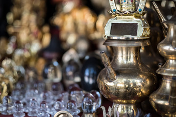 Brass utensils shop with handicrafts and souvenirs in Kathmandu market, Nepal