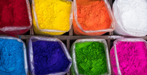 Colorful rangoli powder for sale on Kathmandu street market, Nepal