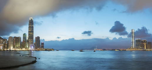 Naklejka premium Panorama of Victoria Harbor of Hong Kong at dusk