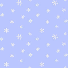 Seamless winter pattern with scattered white snowflakes