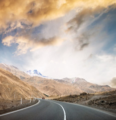 Landscape with beautiful road in Georgia at sunset