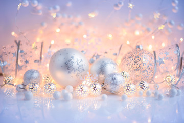 Fototapeta na wymiar Christmas decorative balls and Christmas lights. Festive Christmas background.