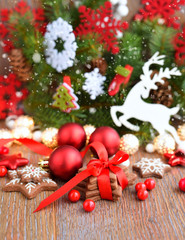 Christmas cookies with festive decorations on a wooden table