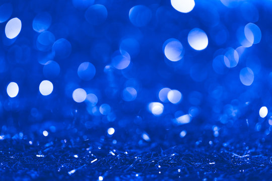 christmas blue blurred shiny confetti with bokeh