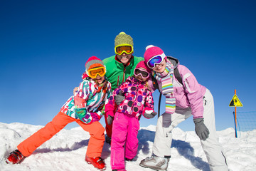 family in alpin ski resort