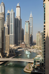 Fototapeta na wymiar Modern buildings in Dubai, skyscrapers architecture desert locations UAE.