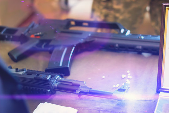 sub machine gun on the table in the interior gunsmith.