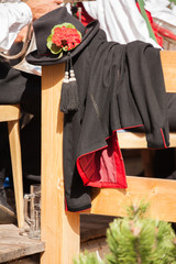 Detail of typical costume during an autumn local celebration in Val di Funes ( South Tyrol )
