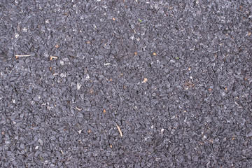 Asphalt road texture gray stone seamless background.