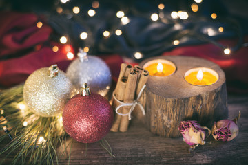Christmas Ornaments And Lights On A Wooden Table