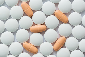 White and orange pills