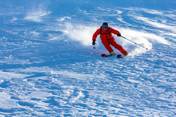 A skier on the slope.