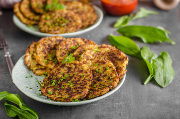 Potato pancakes, fried chicken with potatoes