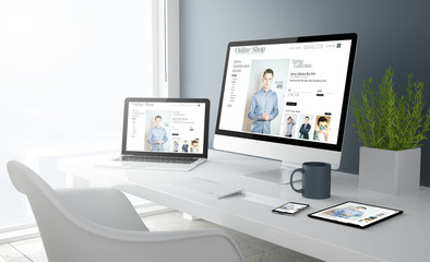 grey studio devices with fashion online shop website