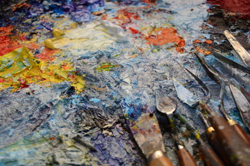 A painter's palette in his workshop