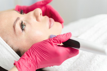 Mesotherapy and dermapen on female face