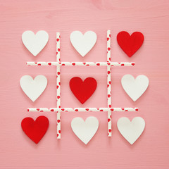 Valentine's day concept with hearts X-O game. Top view.