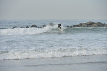 Surfing at Venice beach in California
