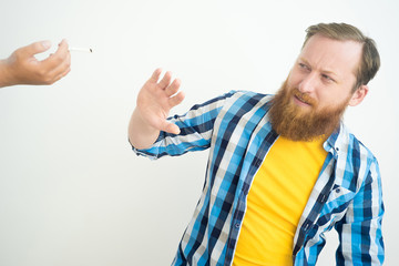 Man refusing a cigarette