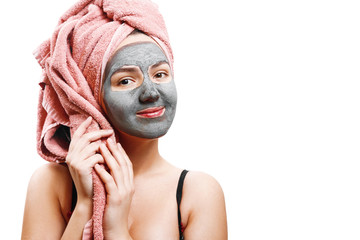 mask for skin woman, happy girl holding a towel, girl enjoys a mask for face skin, isolated photo,
