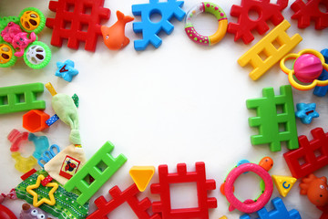 Children's toys and accessorieson a White background.view from above