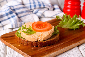 sandwich with sliced vegetarian sausage