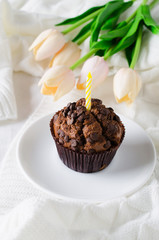 Birthday chocolate muffins or capkakes and tulips.