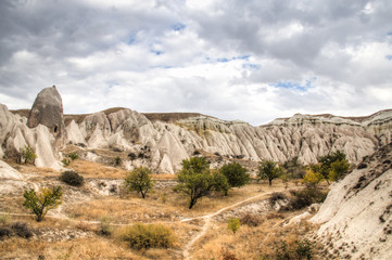 Fototapeta na wymiar Inside the red and rose valley in Cappadocia in Turkey 