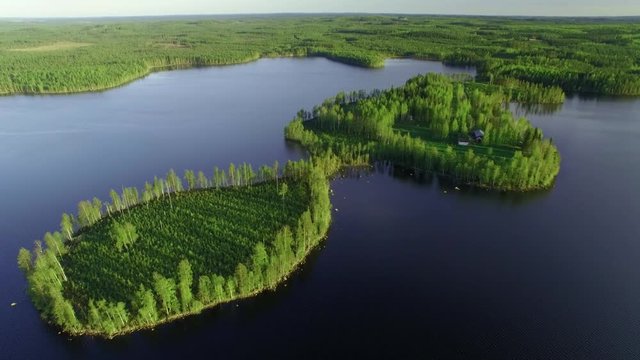 Small farm house in a small scenic cape at a lake in Finland.