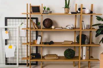 Fototapeta na wymiar brown wooden shelves with stuff at home