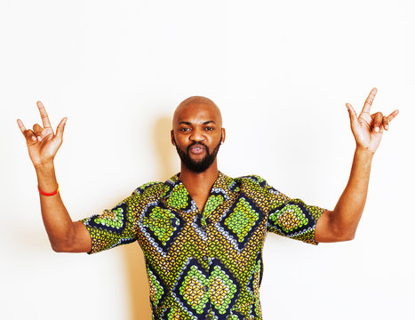 portrait of young handsome african man wearing bright green nati
