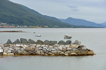 Fototapeta na wymiar Telegrafbukta Beach and boats in sea, Tromso, Norway