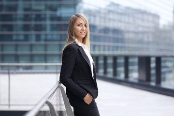 pretty businesswoman in urban environment