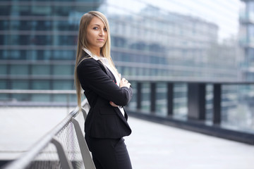 Fototapeta premium pretty businesswoman in urban environment