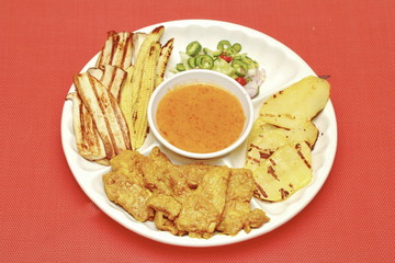 Charcoal boiled ,Pork satay served with side disk.