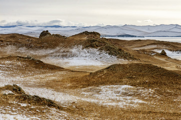 View above big beautiful lake and mountain in winter, Baikal lake, Russia