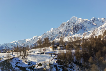 Landscape with the mountains and ski slopes of  the ski area of Rosa Khutor, Krasnaya Polyana, Sochi, Russia.