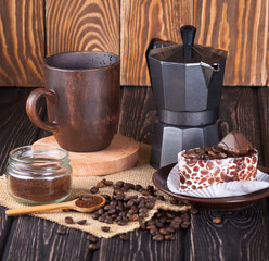 Fototapeta na wymiar Coffee maker with brown cup