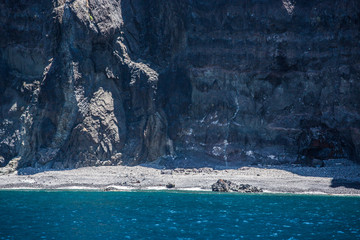 Cliff offshore island rocky beach - Madeira Portugal