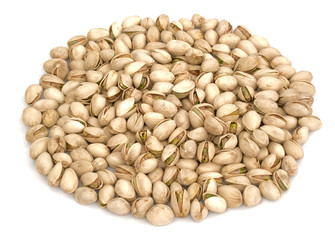 Heap of roasted Pistachio nuts isolated on white background