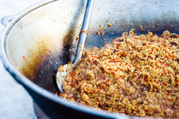 cook pilaf on the street