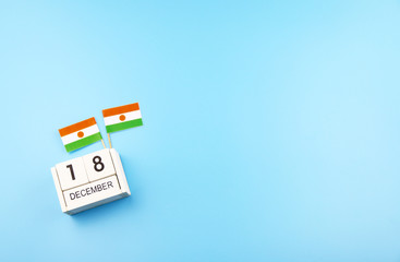 Fototapeta na wymiar December 18 Wooden calendar Concept independence day of Niger and Niger national day with space for your text.