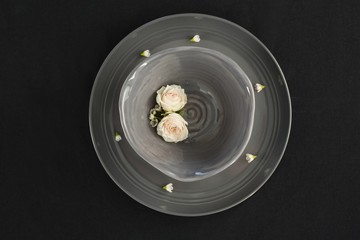 Beautiful table setting with floral arrangement