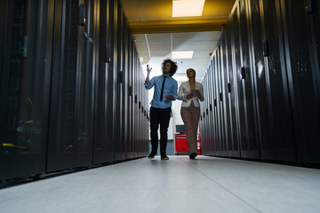 Young couple working at a data center