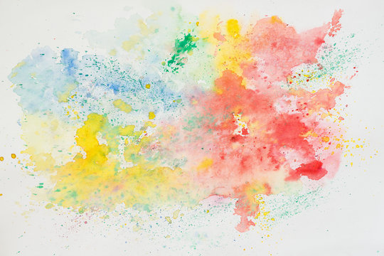 Abstract watercolor background, iridescent texture in colorful shades of vivid bright colors on white paper, rainbow