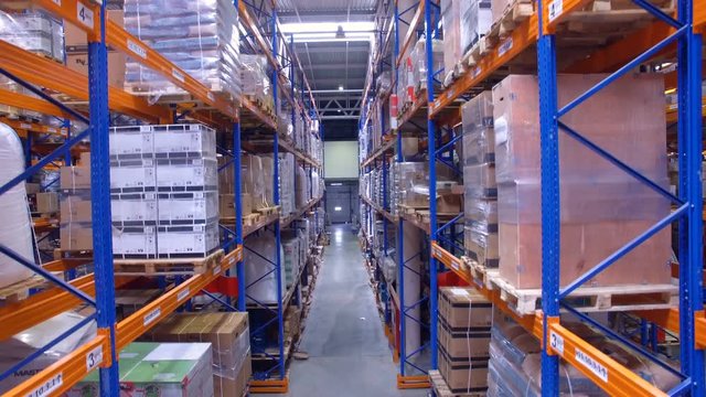 A downwards shot of many levels of warehouse racks. 