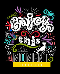 Poster on black background "Enjoy this moment"