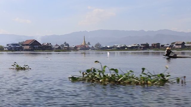 Boat crossing on the water in Inle lake, Burma. Myanmar popular travel destination